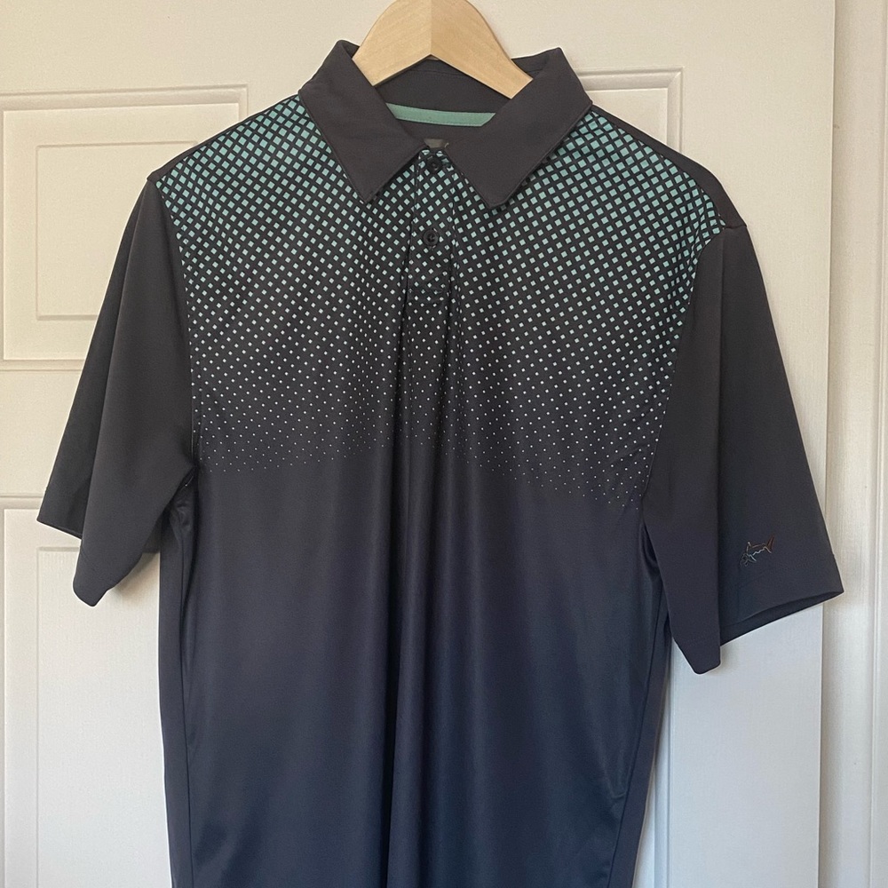 Greg norman golf shirt, 100% polyester, size small.